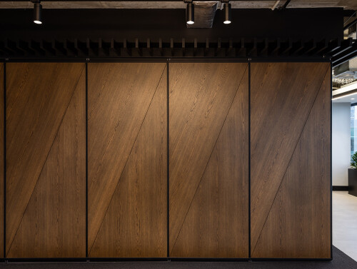 HGM Boardroom with operable doors closed timber finish