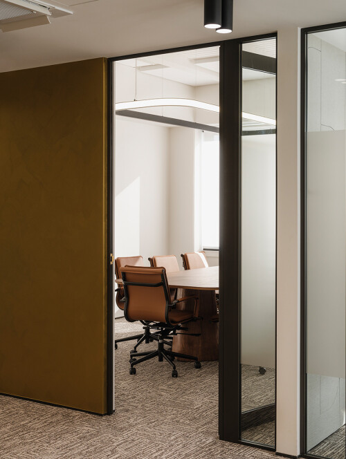 Sainsbury Logan & Williams meeting room detailed shot through door